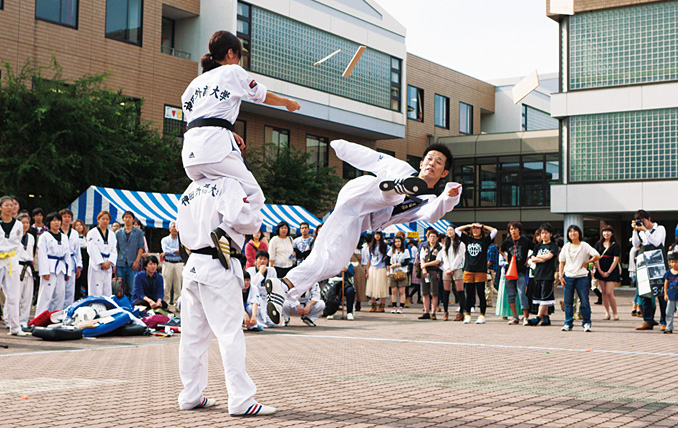 Karate Demonstration, with a very high kick to break boards