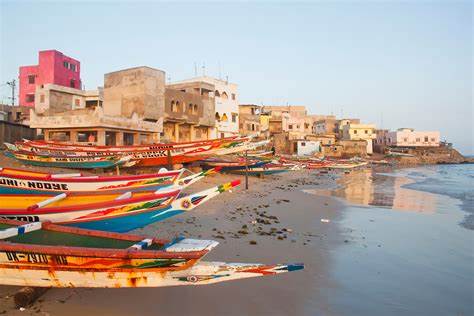 Boats and Buildings by a Beach