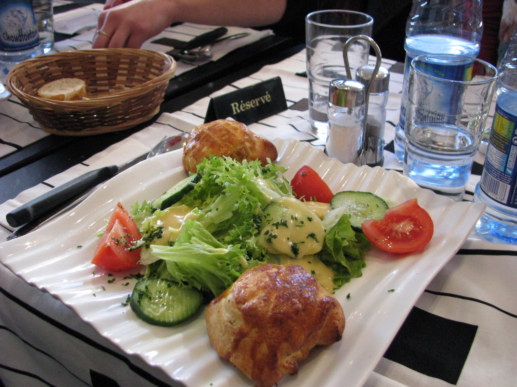 salad and other foods on a plate